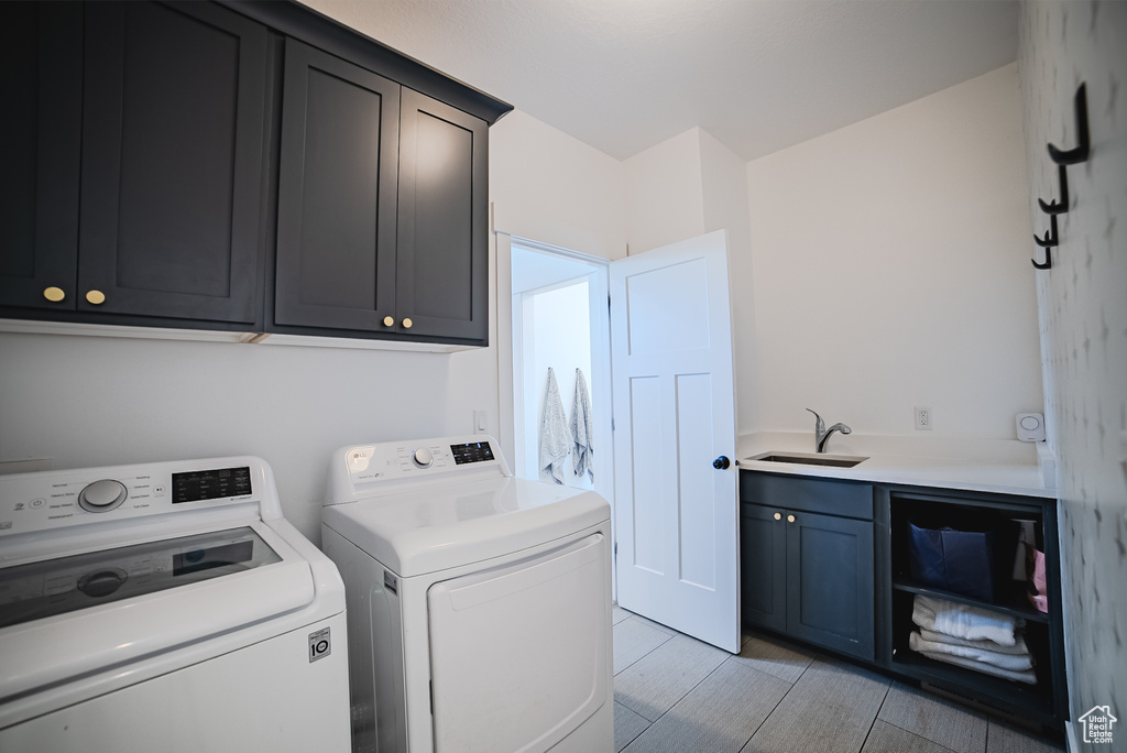 Washroom with separate washer and dryer and cabinet space