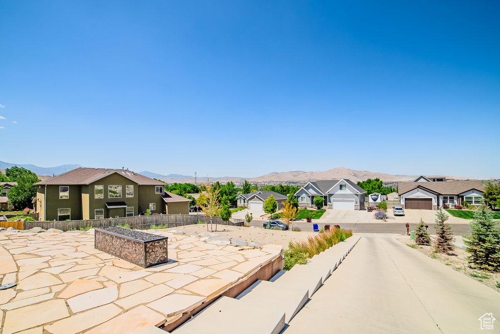 View of patio featuring a mountain view and a residential view