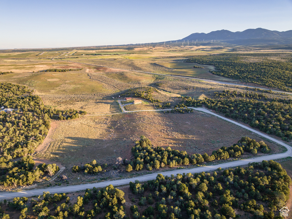 Aerial overview of property's location featuring mountains and rural landscape