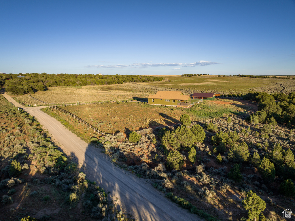 Aerial view of property and surrounding area featuring rural landscape