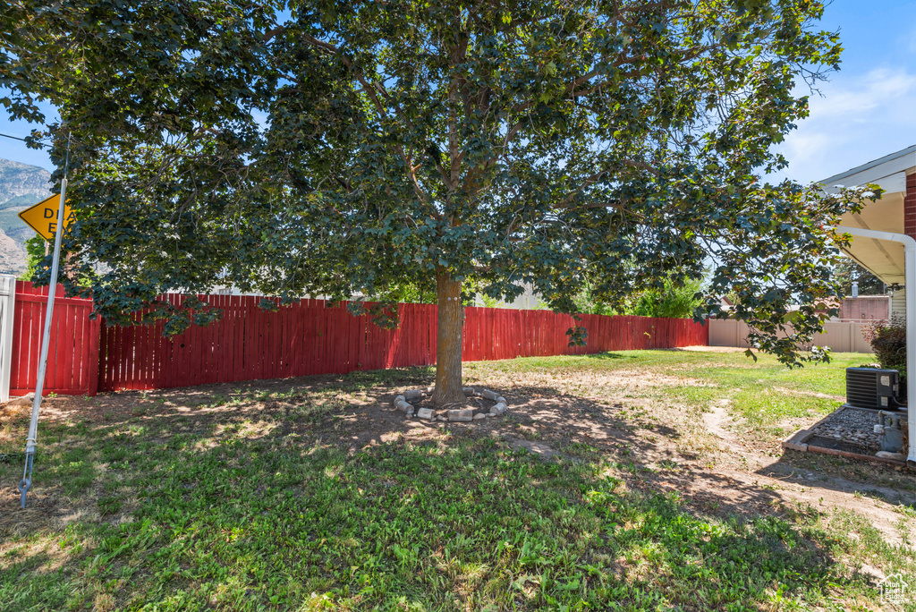 View of fenced backyard