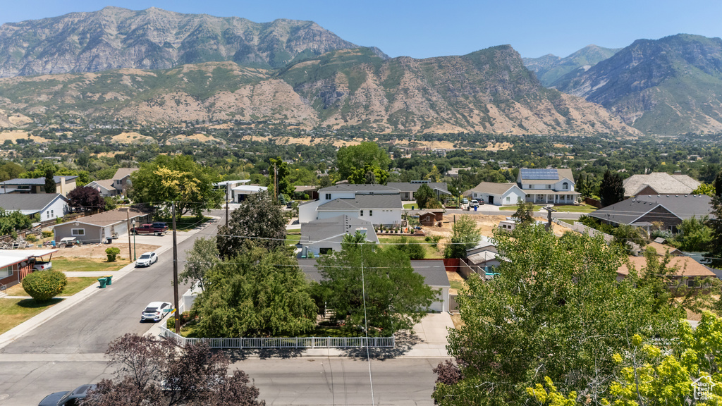 View of mountain backdrop with nearby suburban area