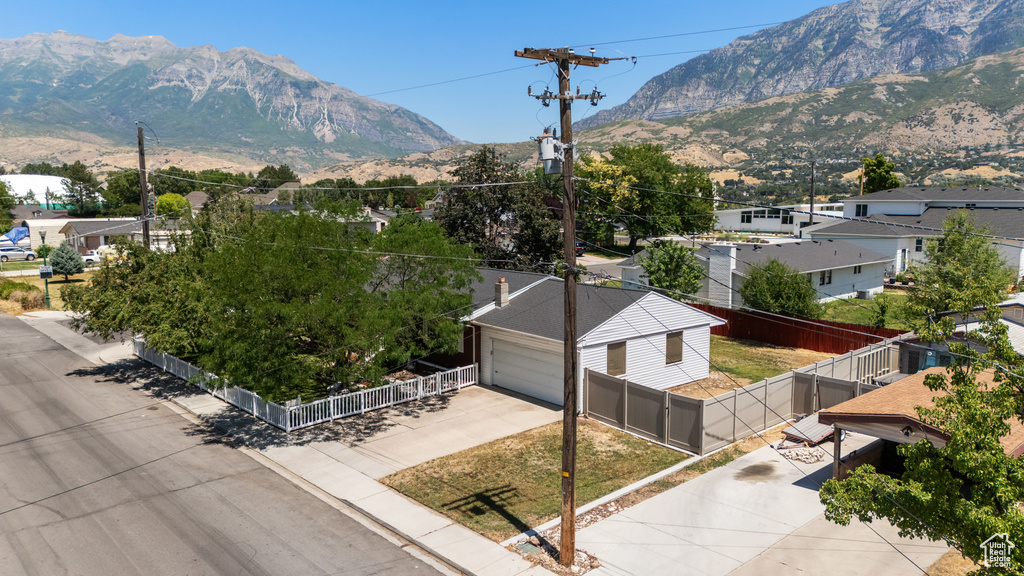 View of mountain background featuring nearby suburban area