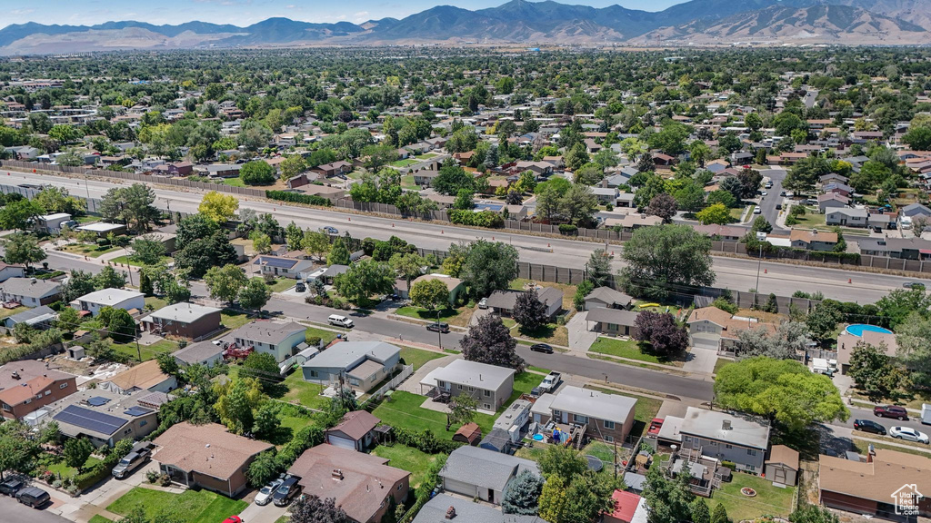 Aerial view of residential area with a mountainous background