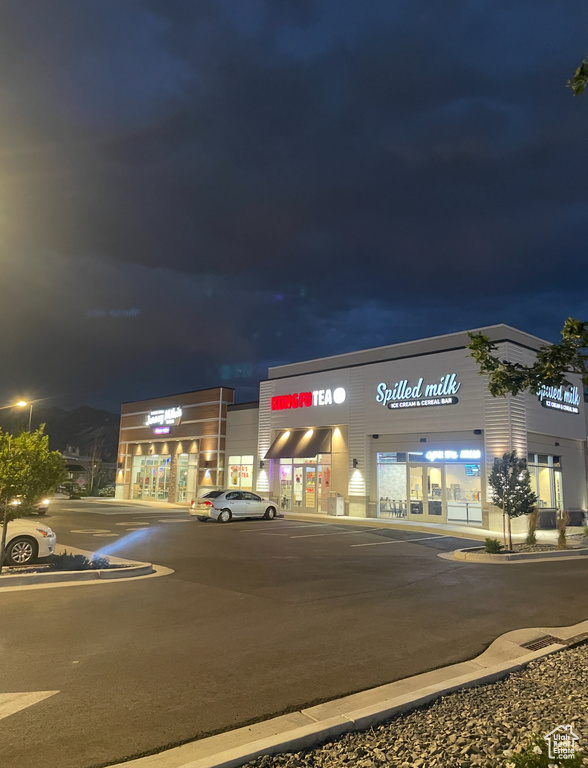 View of property at twilight
