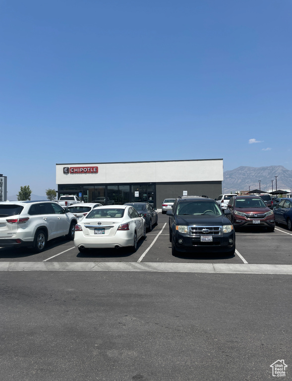 Uncovered parking lot with a mountain view