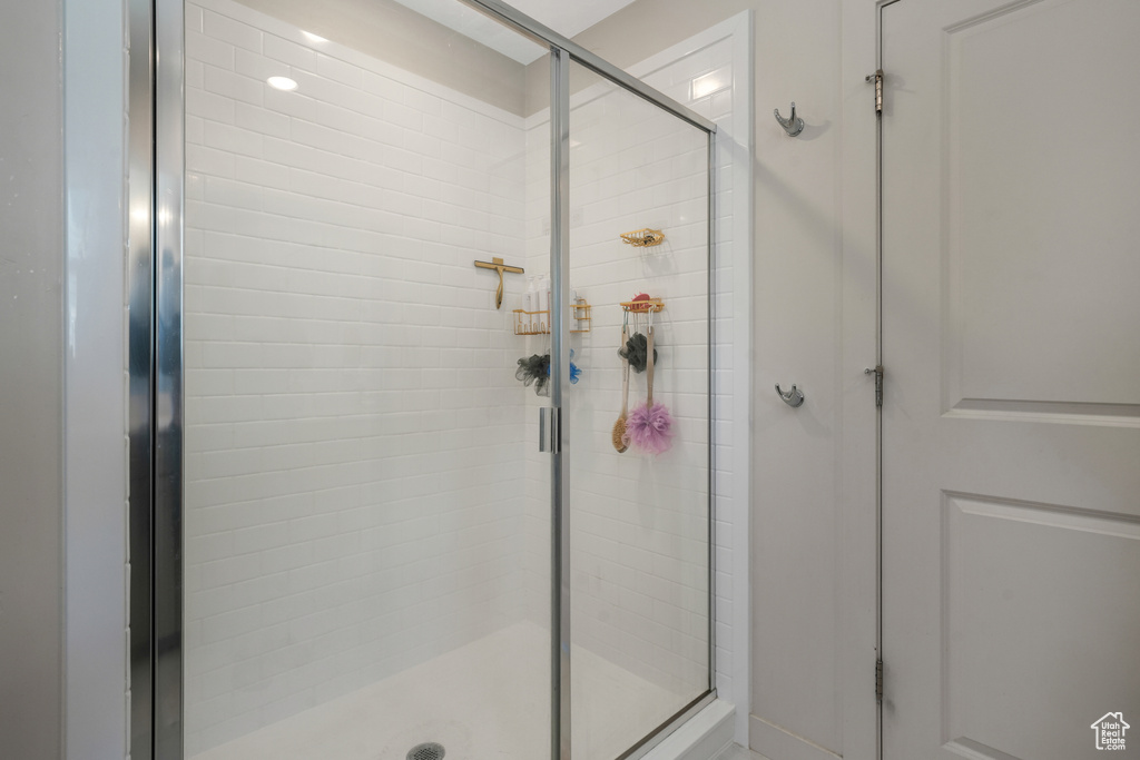 Bathroom featuring a shower stall