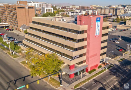 View of building exterior featuring a view of city