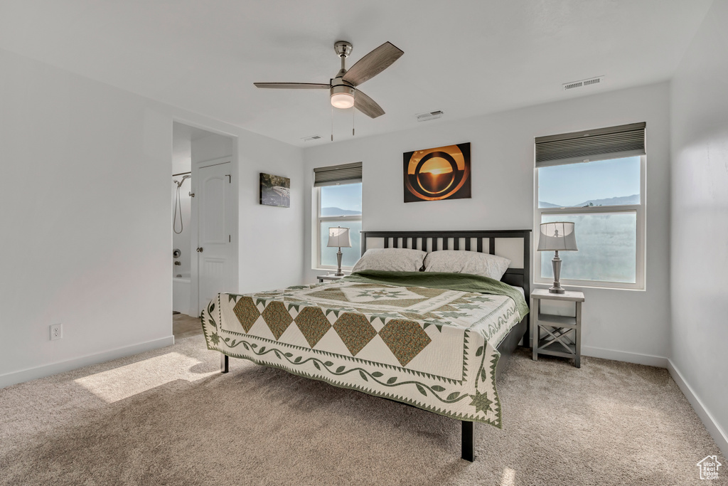 Bedroom featuring carpet and ceiling fan
