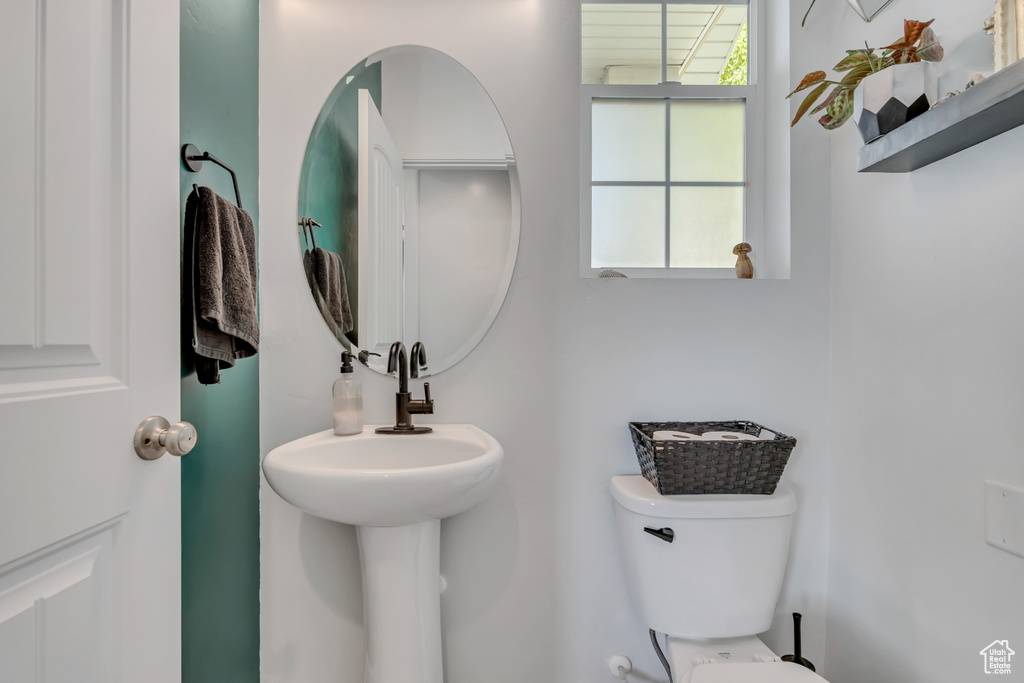 Half bathroom featuring toilet