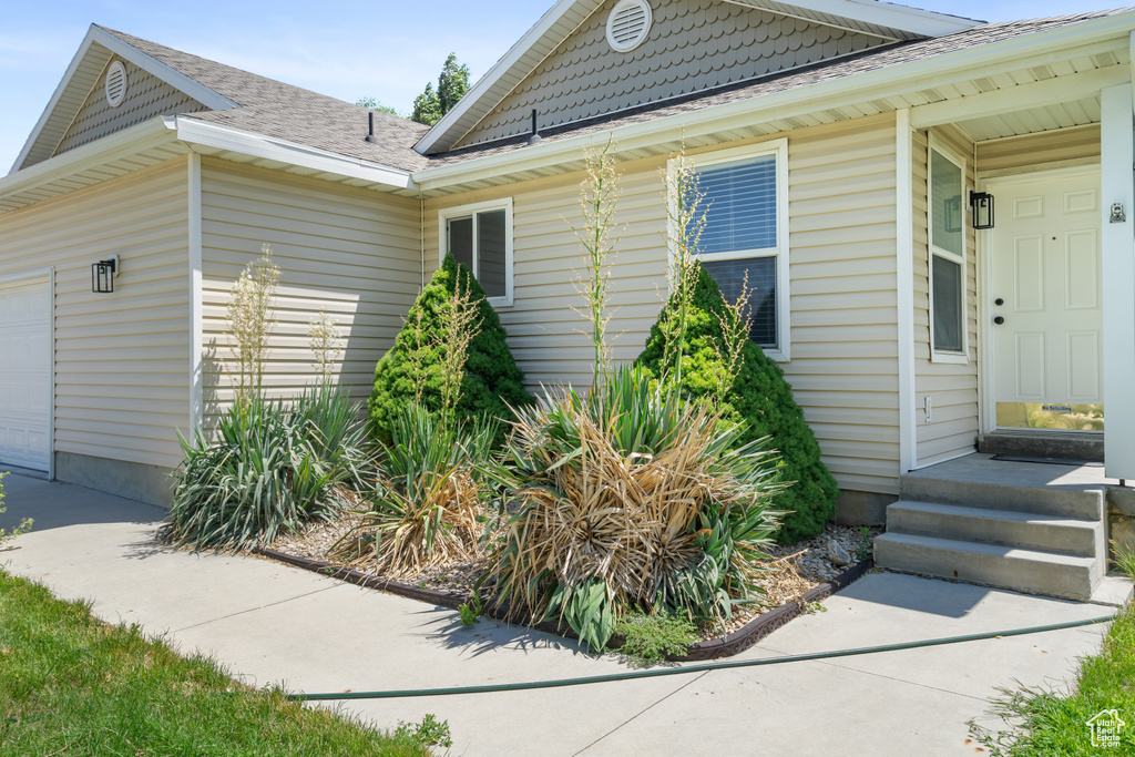 View of home\'s exterior with a garage