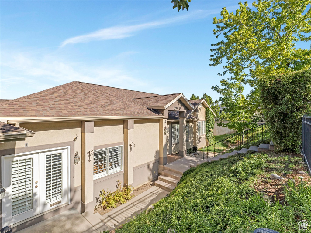 View of home\\\\\\\\\\\\\\\\\\\\\\\\\\\\\\\\\\\\\\\\\\\\\\\\\\\\\\\\\\\\\\\'s exterior featuring stucco siding and a shingled roof