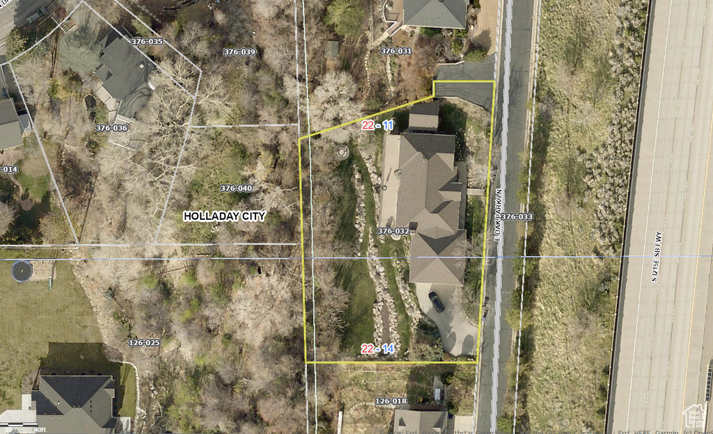 Aerial map of property and surrounding area with property boundaries highlighted