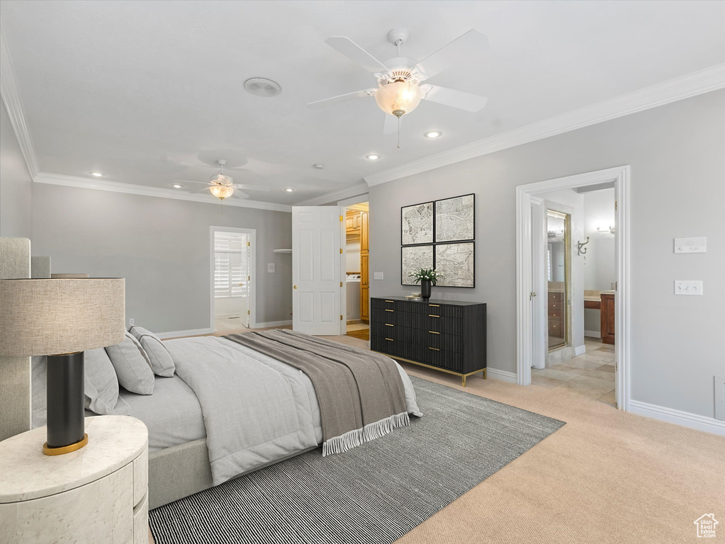 Bedroom featuring crown molding, recessed lighting, light carpet, a ceiling fan, and ensuite bathroom