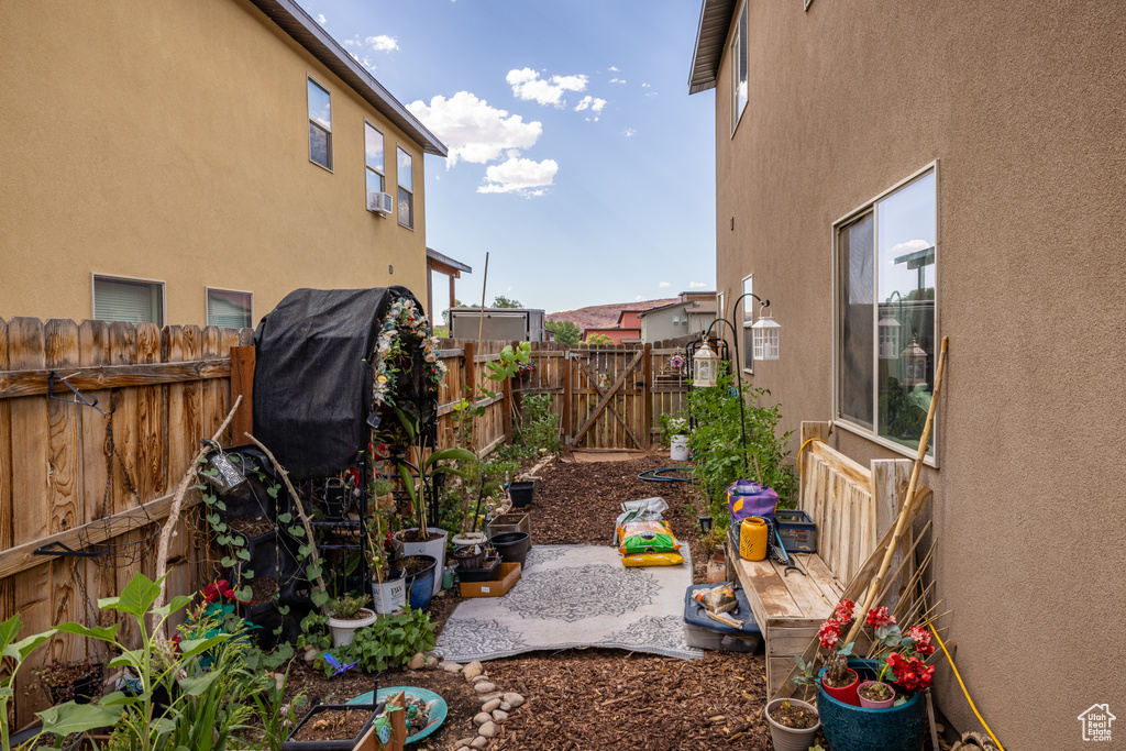Fenced backyard with a gate
