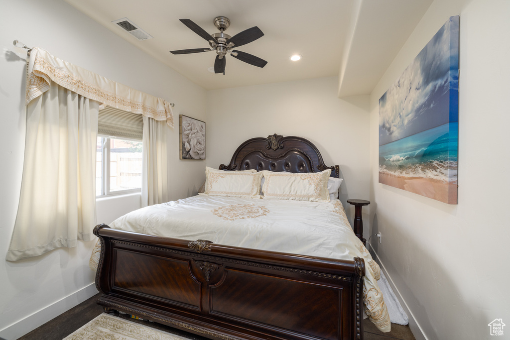 Bedroom featuring ceiling fan, recessed lighting, and wood finished floors