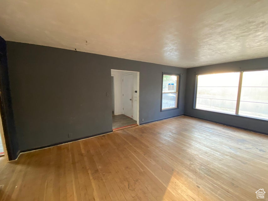 Empty room with light wood-style flooring