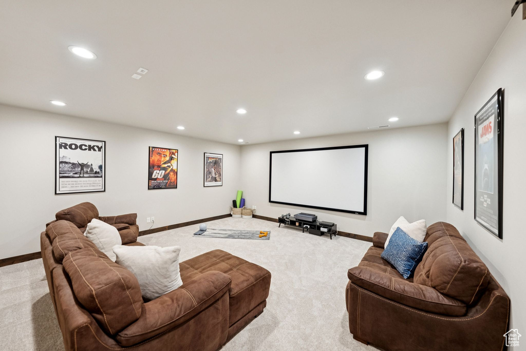 Cinema featuring carpet floors and recessed lighting
