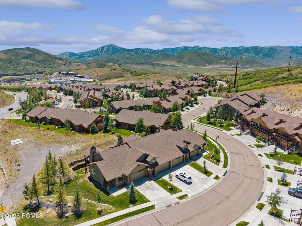 Aerial view of residential area with a mountain backdrop