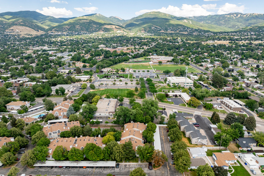 Aerial view of residential area with a mountainous background