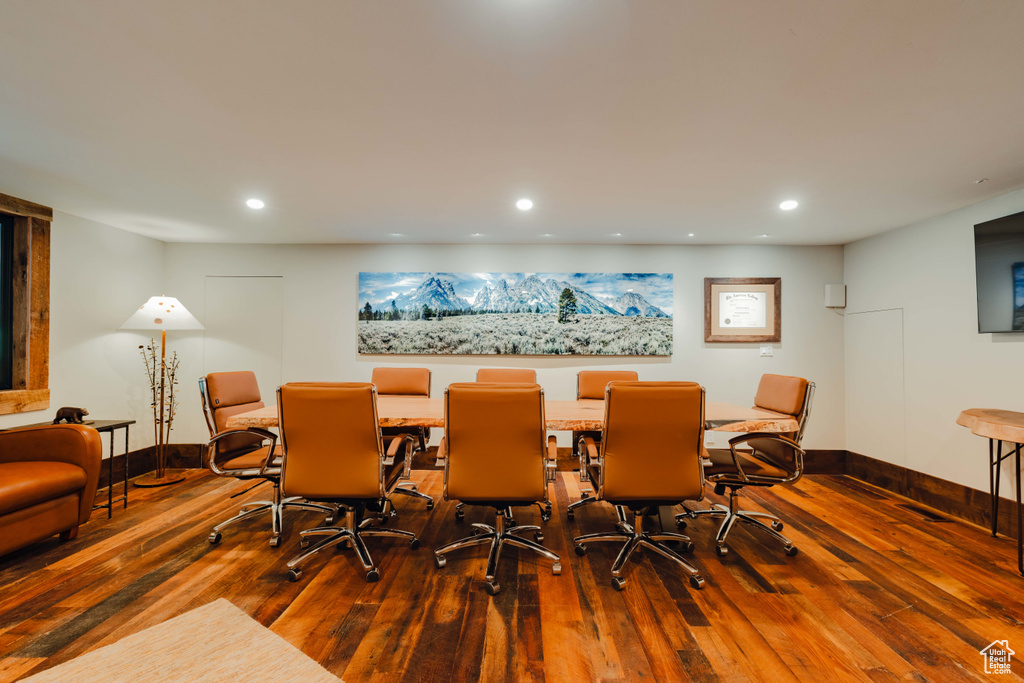 Dining room with wood-type flooring, recessed lighting, and a desk