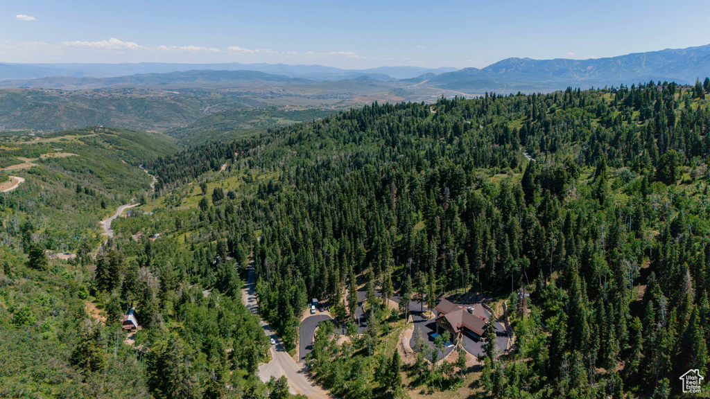 Aerial view of property's location with mountains
