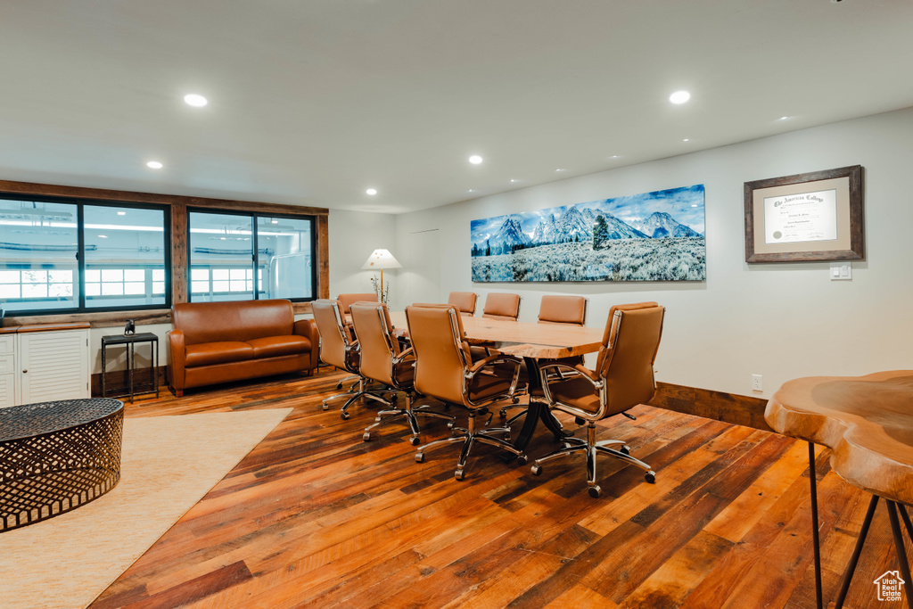 Dining room featuring hardwood / wood-style floors and recessed lighting