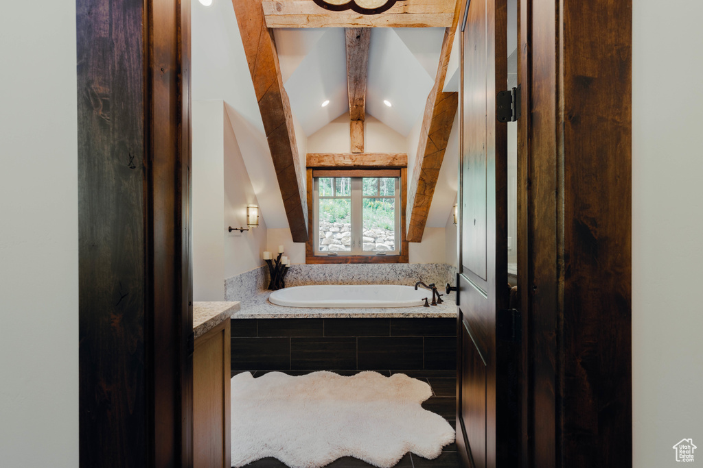 Bathroom with a garden tub and vanity