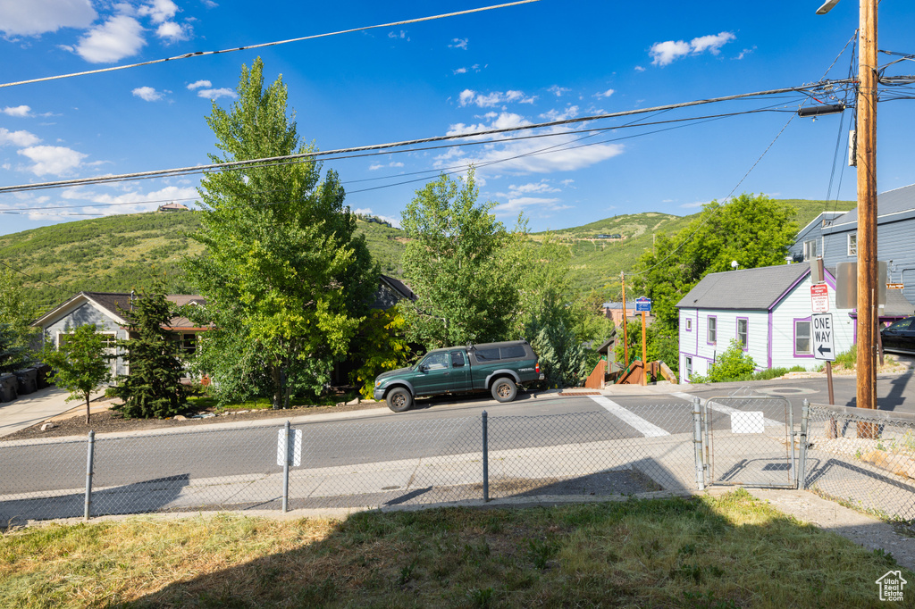 View of road with a gate and a mountain view