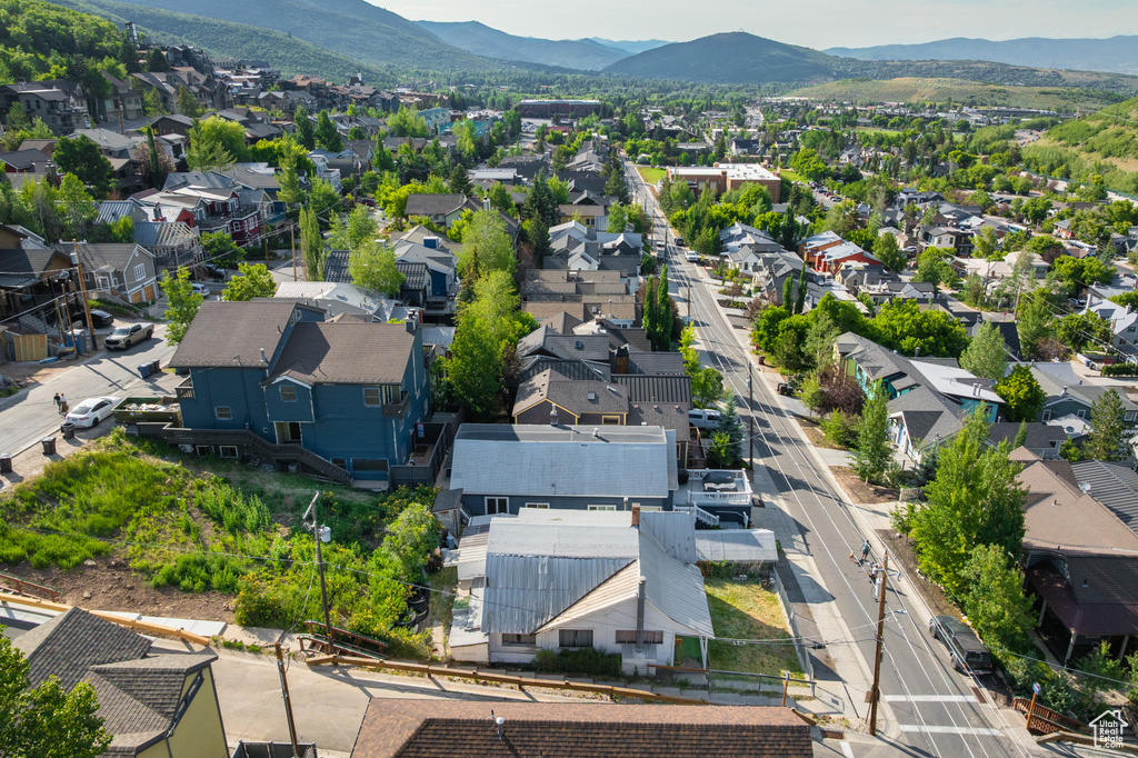 Aerial view of residential area with a mountain backdrop