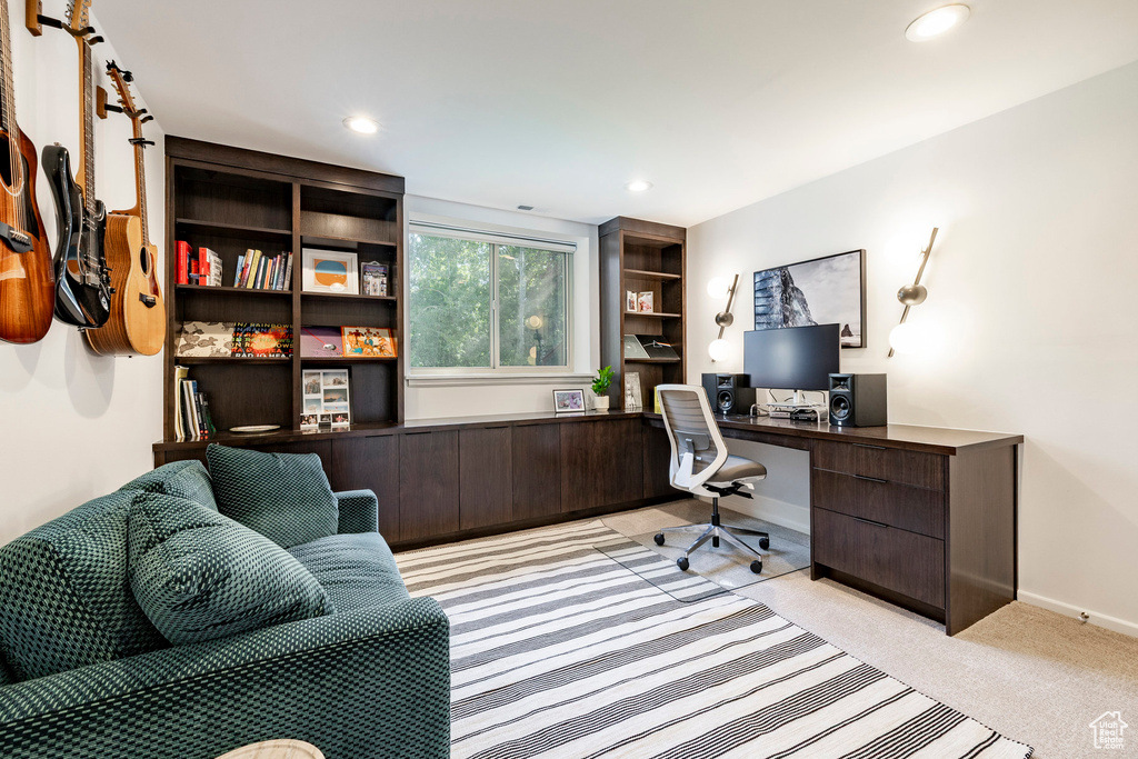 Home office featuring recessed lighting and light carpet