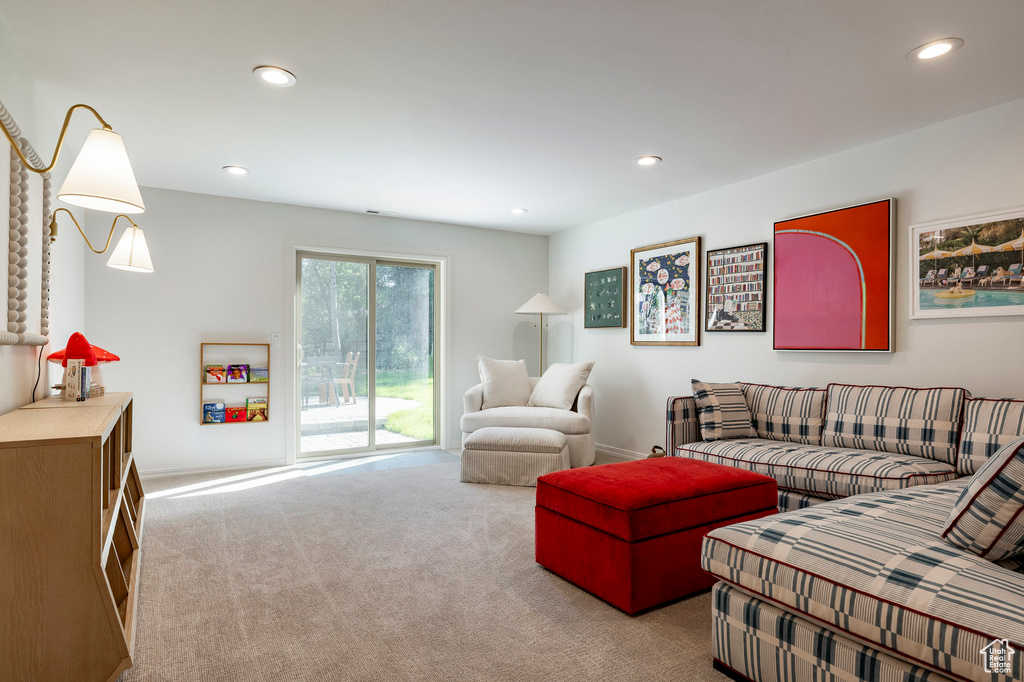 Living area featuring carpet flooring and recessed lighting