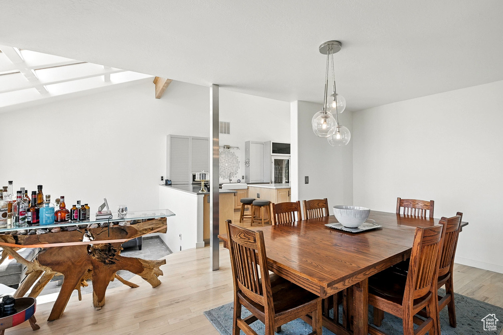 Dining area featuring light wood-style flooring