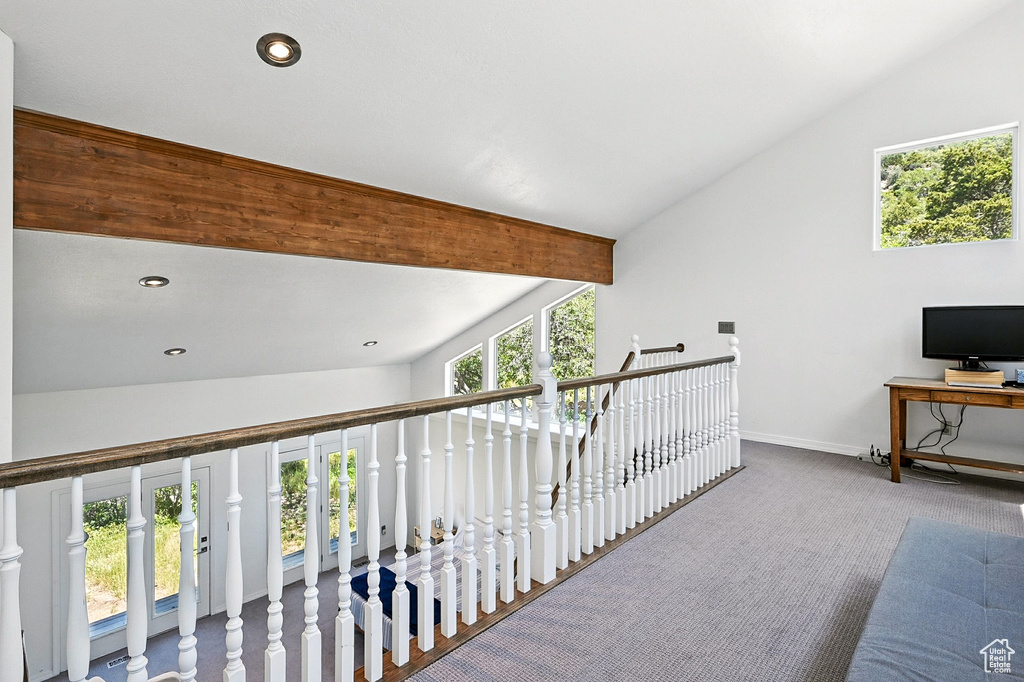 Hall featuring lofted ceiling, carpet floors, and recessed lighting