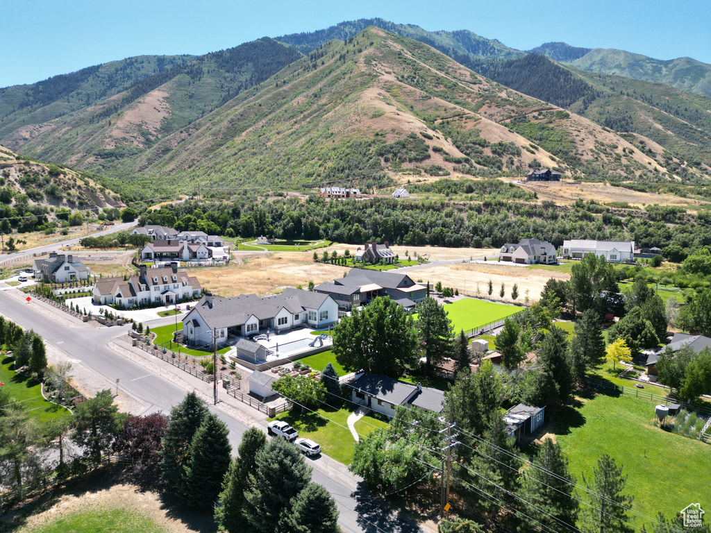 Mountain view featuring nearby suburban area