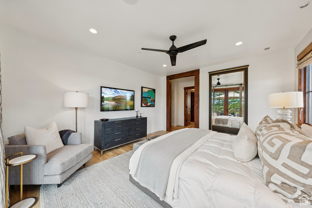 Bedroom featuring recessed lighting, wood finished floors, and a ceiling fan