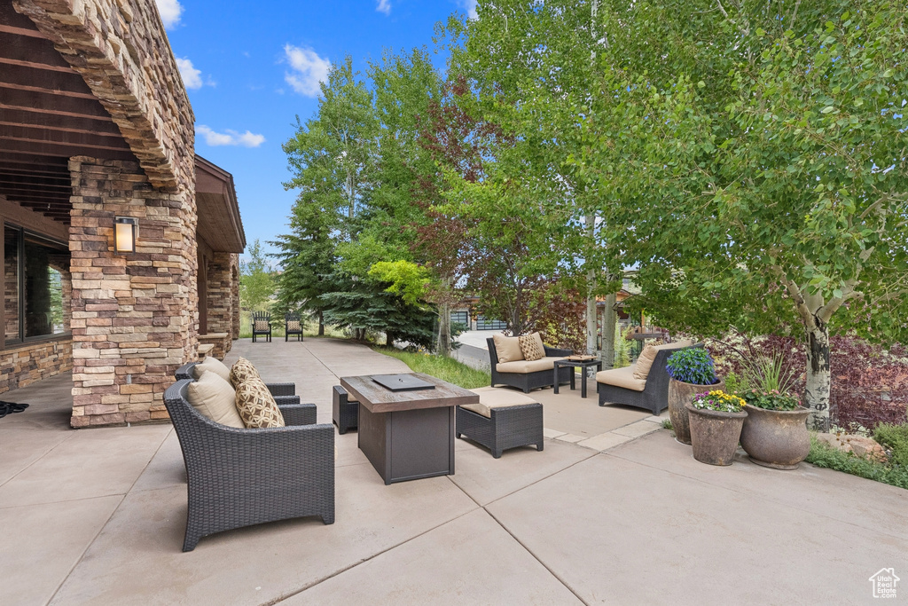 View of patio featuring an outdoor hangout area