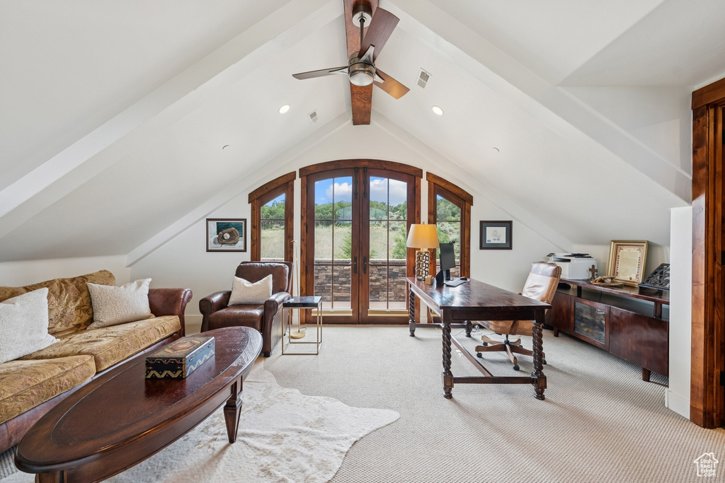 Office space featuring light carpet, french doors, and ceiling fan