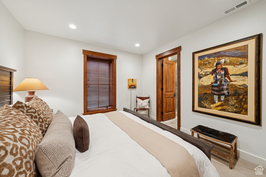Carpeted bedroom featuring recessed lighting