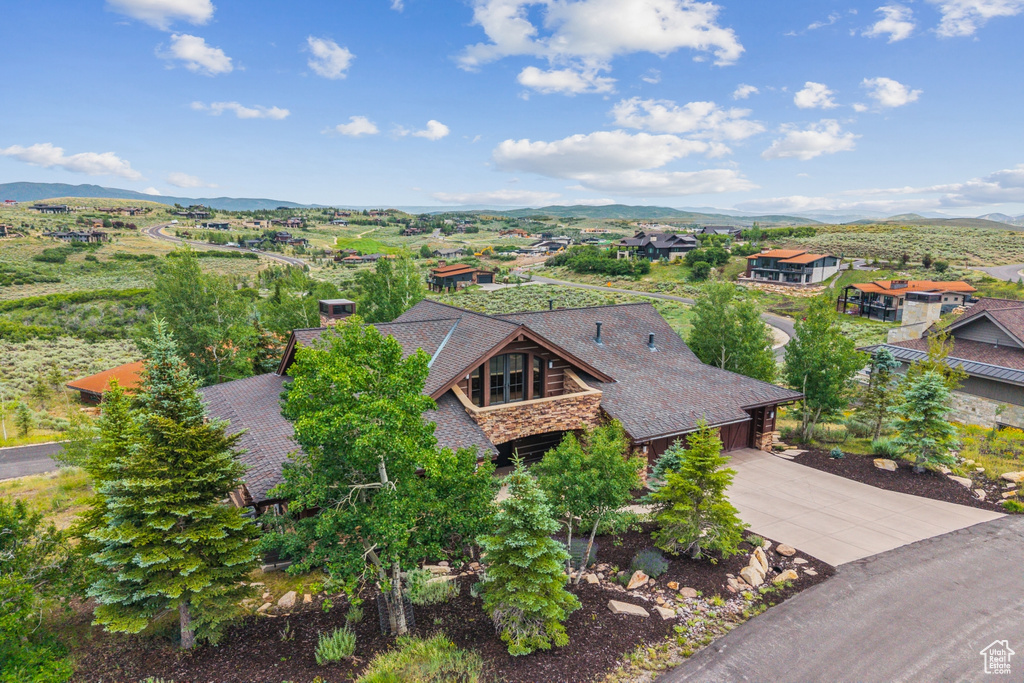 View from above of property with a mountainous background