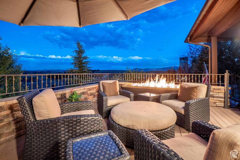 View of patio / terrace featuring an outdoor fire pit