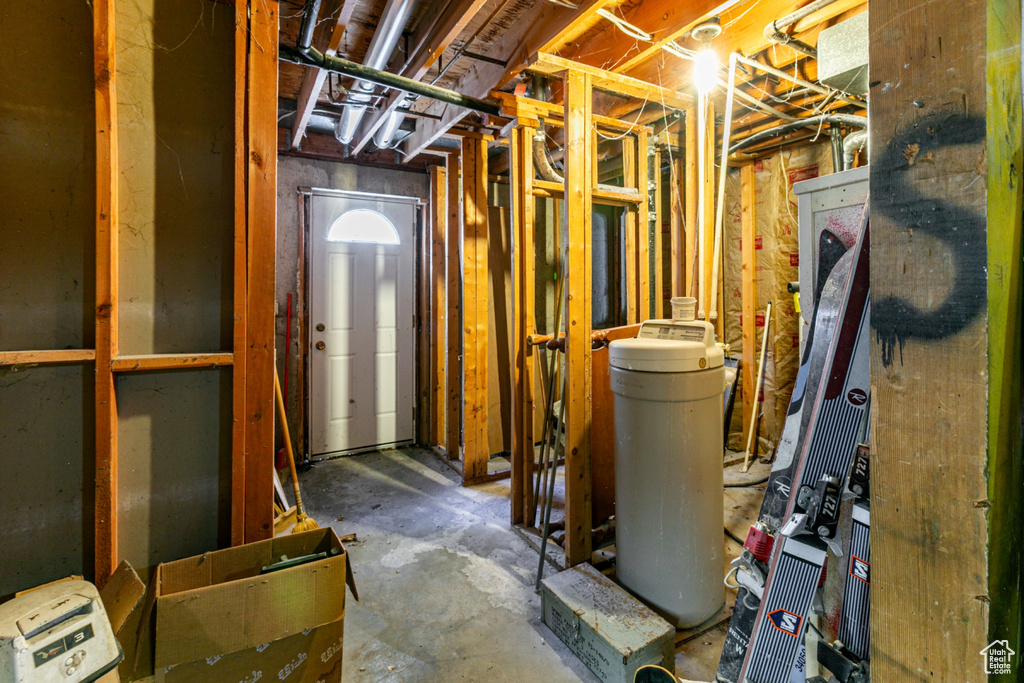 Unfinished basement with a water softener system