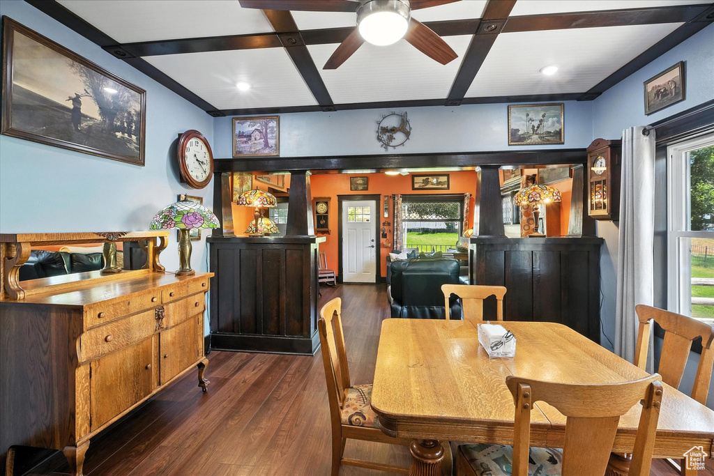 Dining area featuring dark wood-style flooring, ceiling fan, beamed ceiling, and recessed lighting