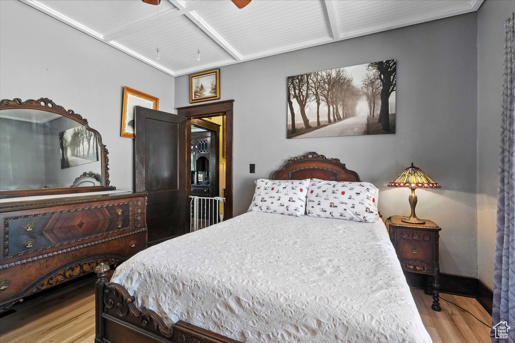 Bedroom featuring wood finished floors and a ceiling fan