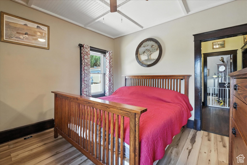 Bedroom featuring wood finished floors and ceiling fan