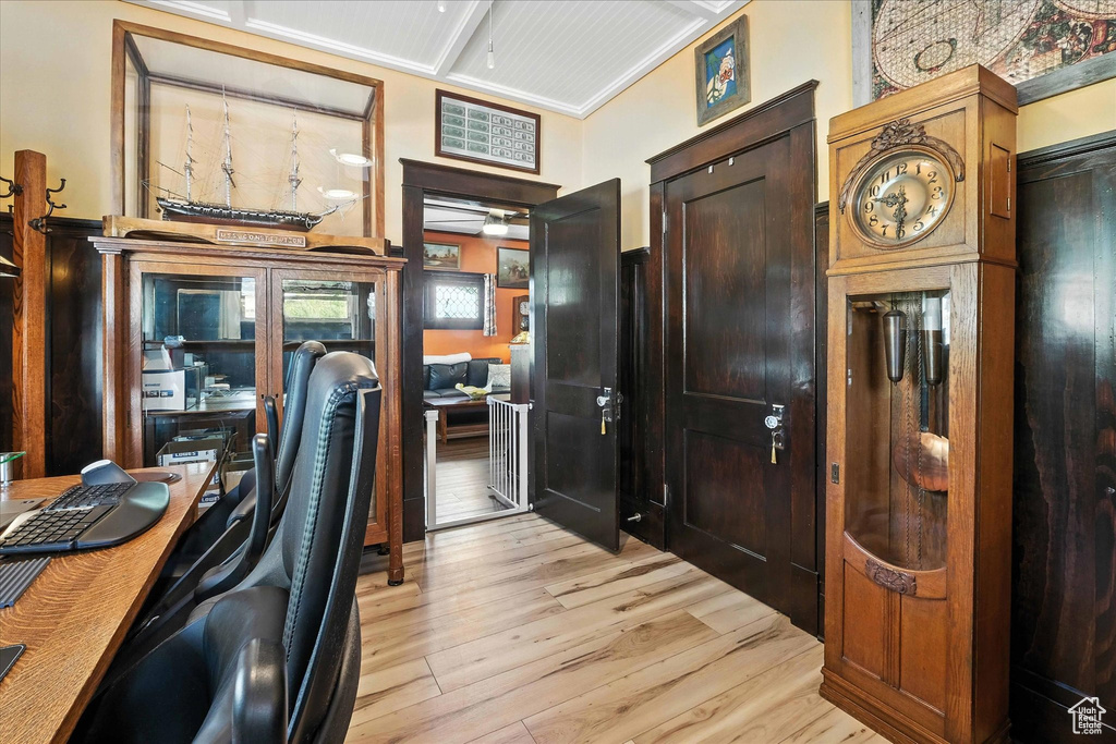Office featuring light wood-style floors and ceiling fan