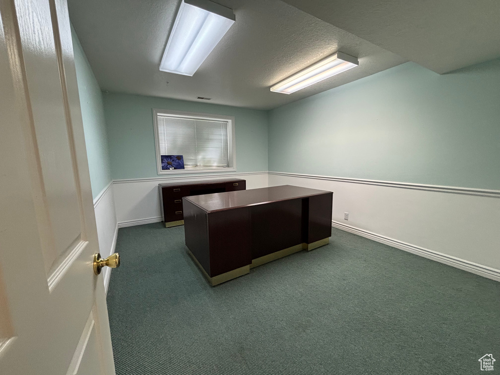 Office with dark carpet
