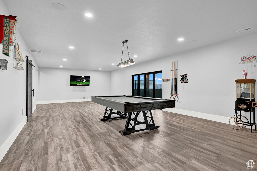 Recreation room featuring recessed lighting, wood finished floors, and billiards