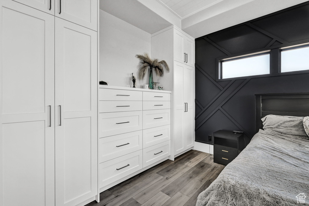Bedroom with wood finished floors