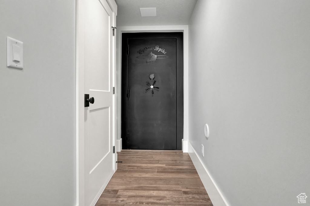 Doorway to outside featuring wood finished floors